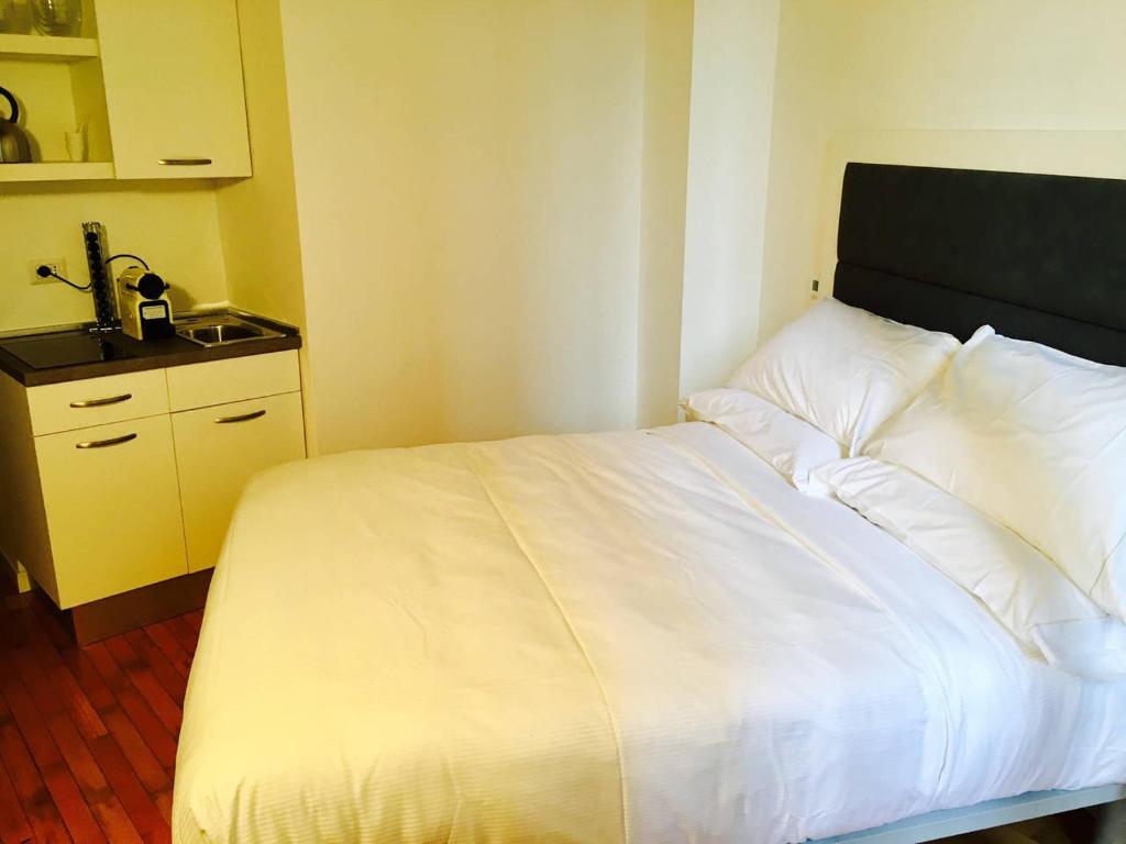 Posteľ alebo postele v izbe v ubytovaní ROOM (boutique room)