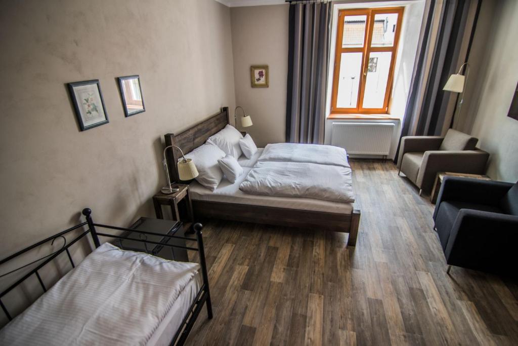 Postel nebo postele na pokoji v ubytování Pension Viktorin