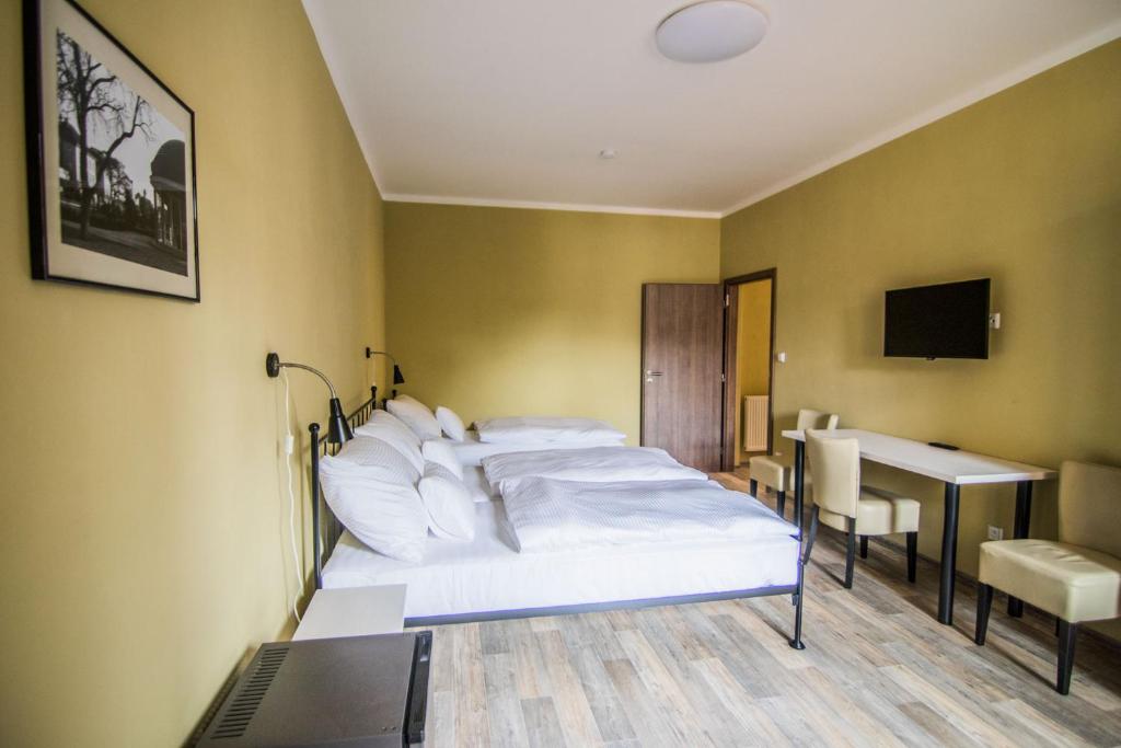 Postel nebo postele na pokoji v ubytování Pension Viktorin