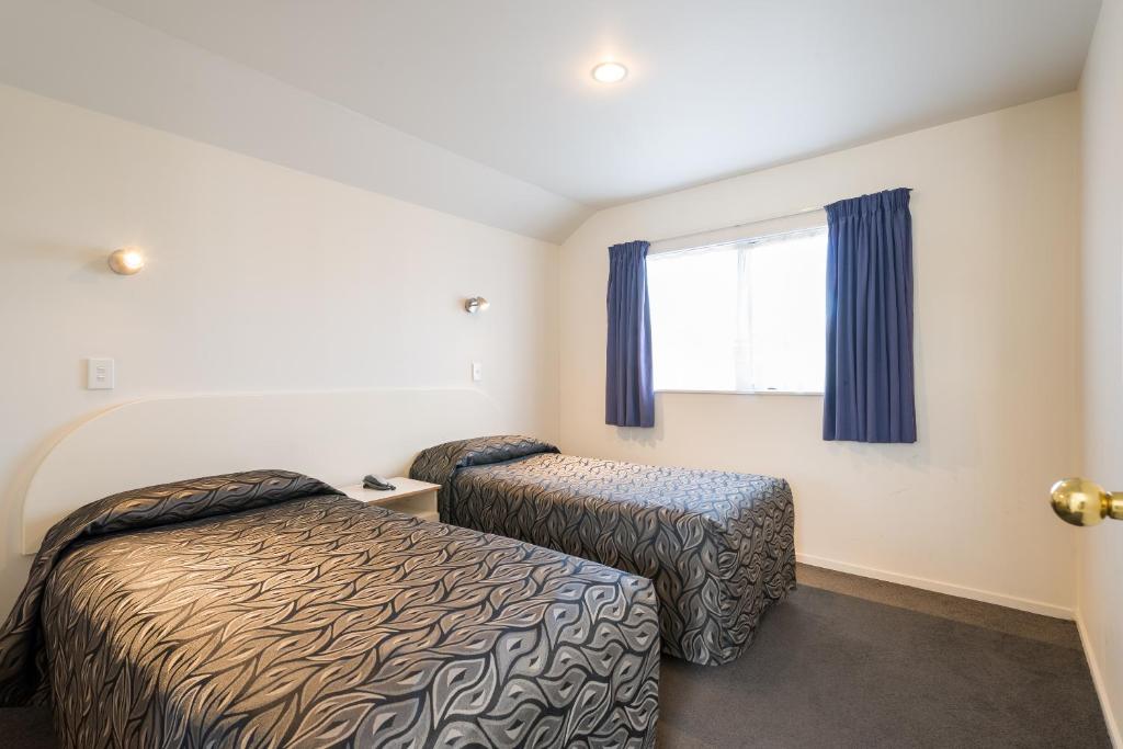Postel nebo postele na pokoji v ubytování Annabelle Court Motel