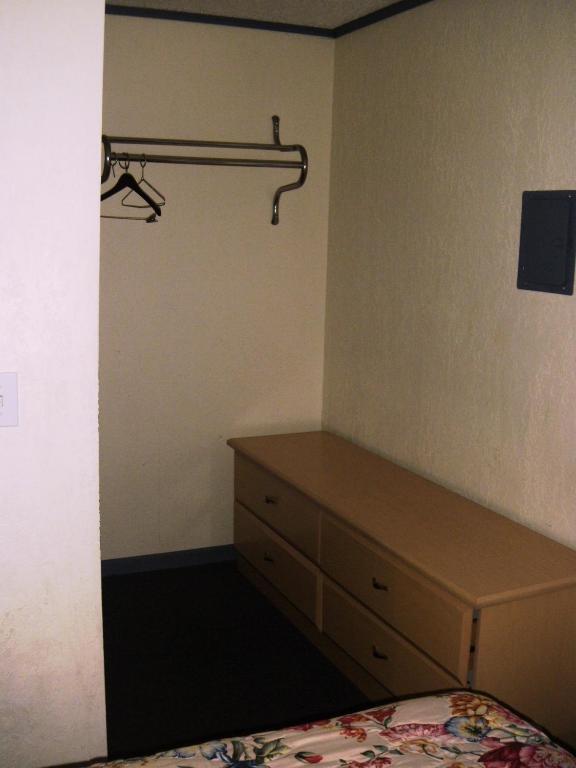 Postel nebo postele na pokoji v ubytování Sunrise Motel