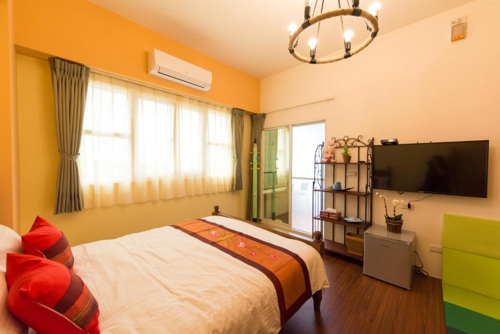 Postel nebo postele na pokoji v ubytování Fruit B&B