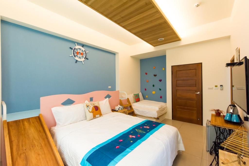 Postel nebo postele na pokoji v ubytování Fruit B&B