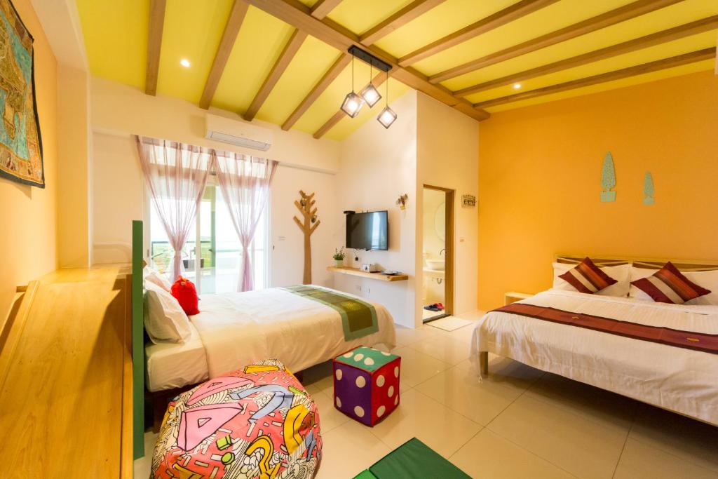 Postel nebo postele na pokoji v ubytování Fruit B&B