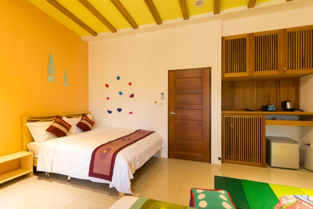 Postel nebo postele na pokoji v ubytování Fruit B&B