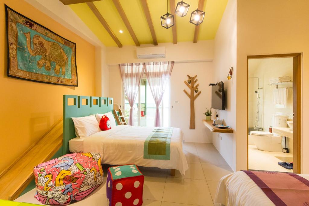 Postel nebo postele na pokoji v ubytování Fruit B&B