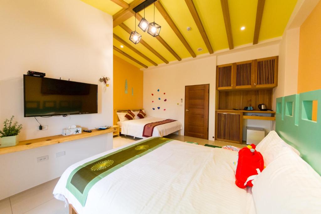 Postel nebo postele na pokoji v ubytování Fruit B&B