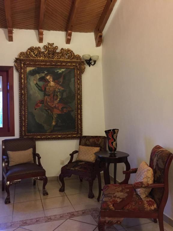 Posezení v ubytování Hotel Mansion Real