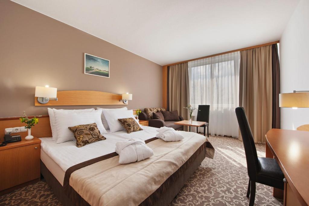 Postel nebo postele na pokoji v ubytování Hotel Termal - Terme 3000 - Sava Hotels & Resorts