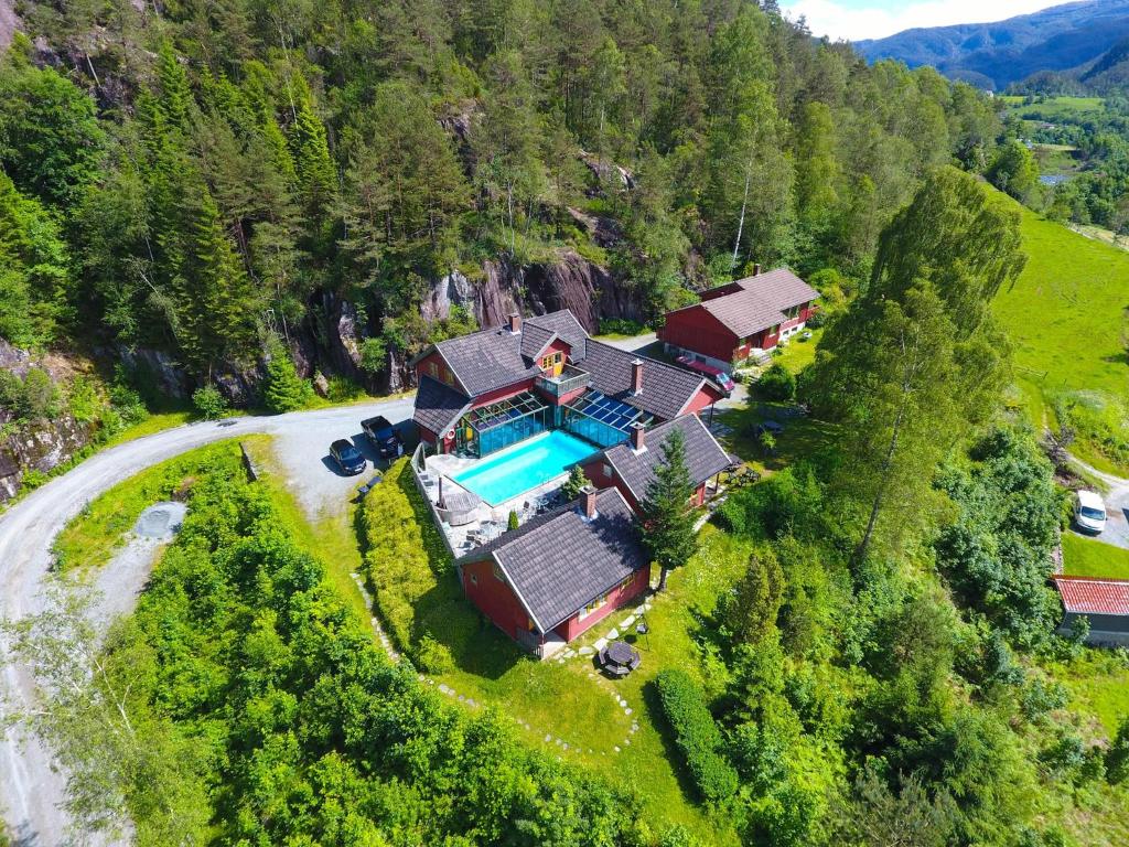 an aerial view of a house with a swimming pool at Mo Laksegard in Sand