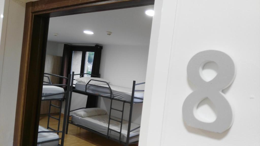 Postel nebo postele na pokoji v ubytování Albergue de Benabarre-CALUMET