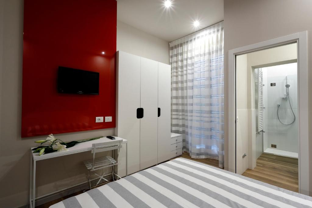 Postel nebo postele na pokoji v ubytování Hotel Aurea