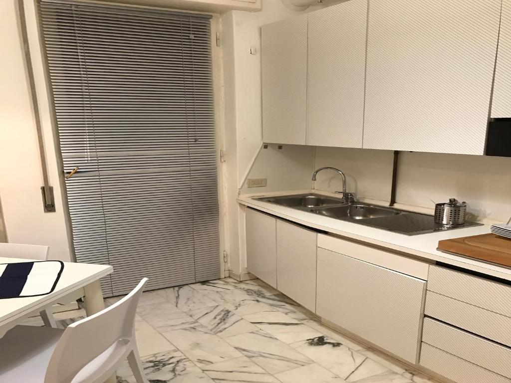 Kuchyň nebo kuchyňský kout v ubytování MyRoom In Town