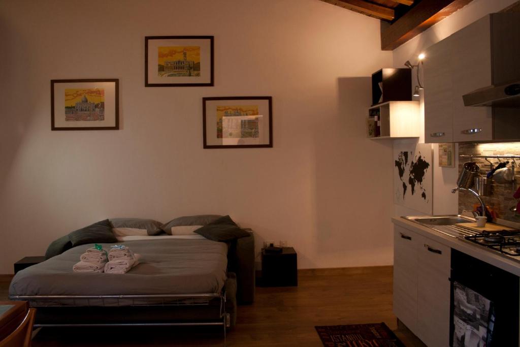 A bed or beds in a room at Le Scalette
