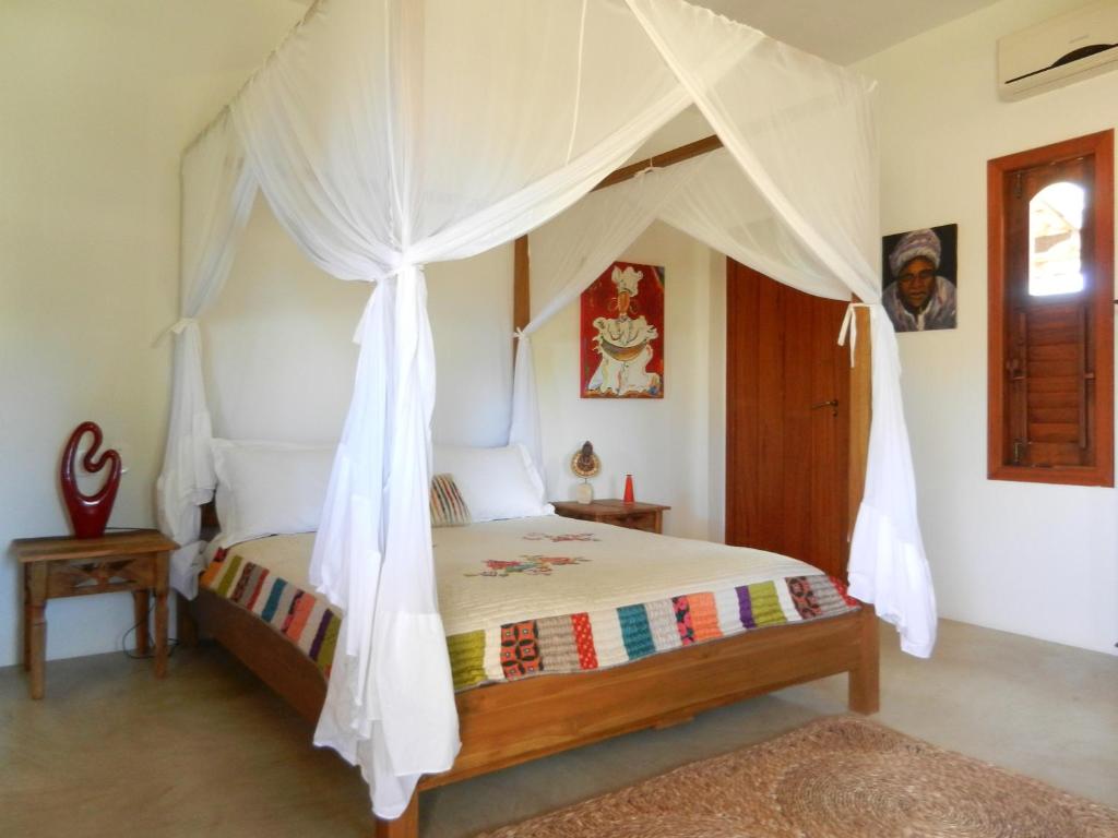 Postel nebo postele na pokoji v ubytování Guest House Villa 2 Santos