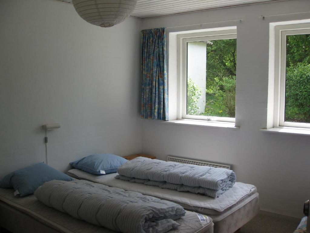 Postel nebo postele na pokoji v ubytování Lyngbjerggaard Ferieboliger - B&B