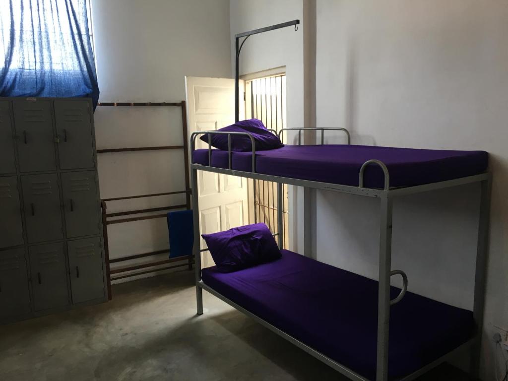 Postel nebo postele na pokoji v ubytování Colombo Beach Hostel