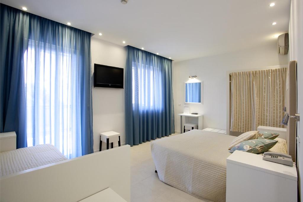 Postel nebo postele na pokoji v ubytování Hotel Speranza