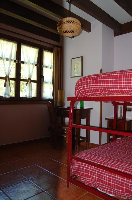 Postel nebo postele na pokoji v ubytování Casa Asprón