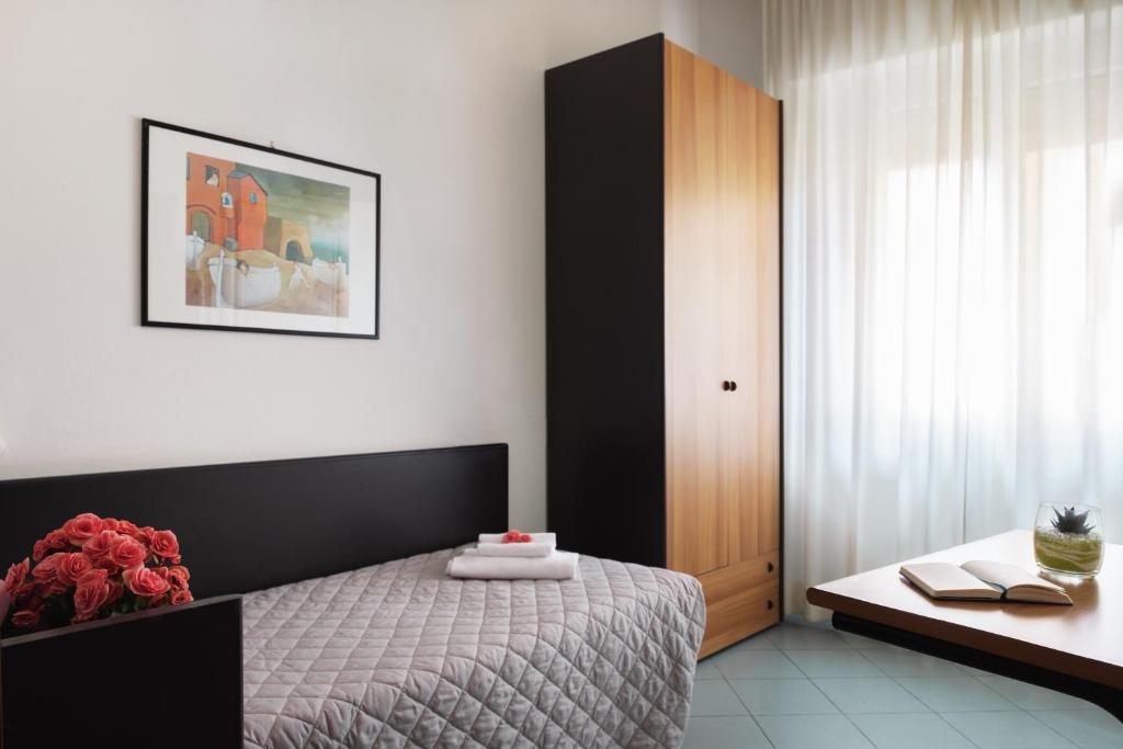 Postel nebo postele na pokoji v ubytování Hotel St Pierre