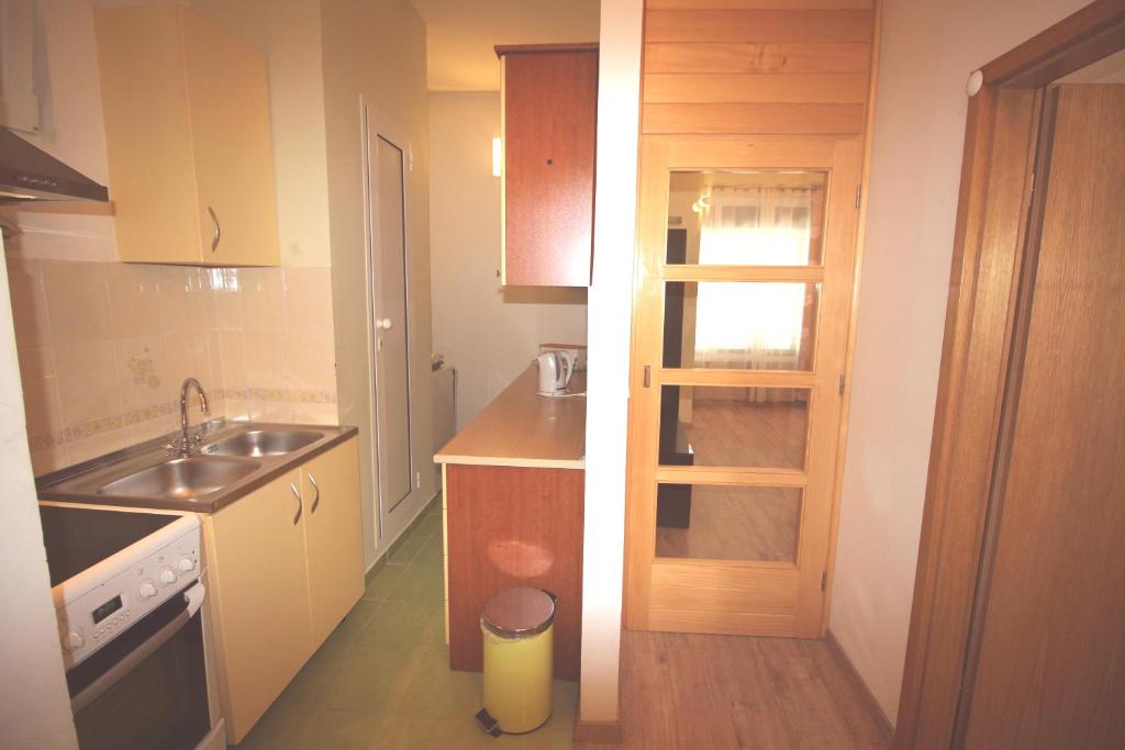 Kuchyňa alebo kuchynka v ubytovaní Apartment J&I
