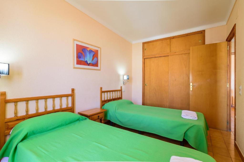Posteľ alebo postele v izbe v ubytovaní Costabravaforrent Masferrer