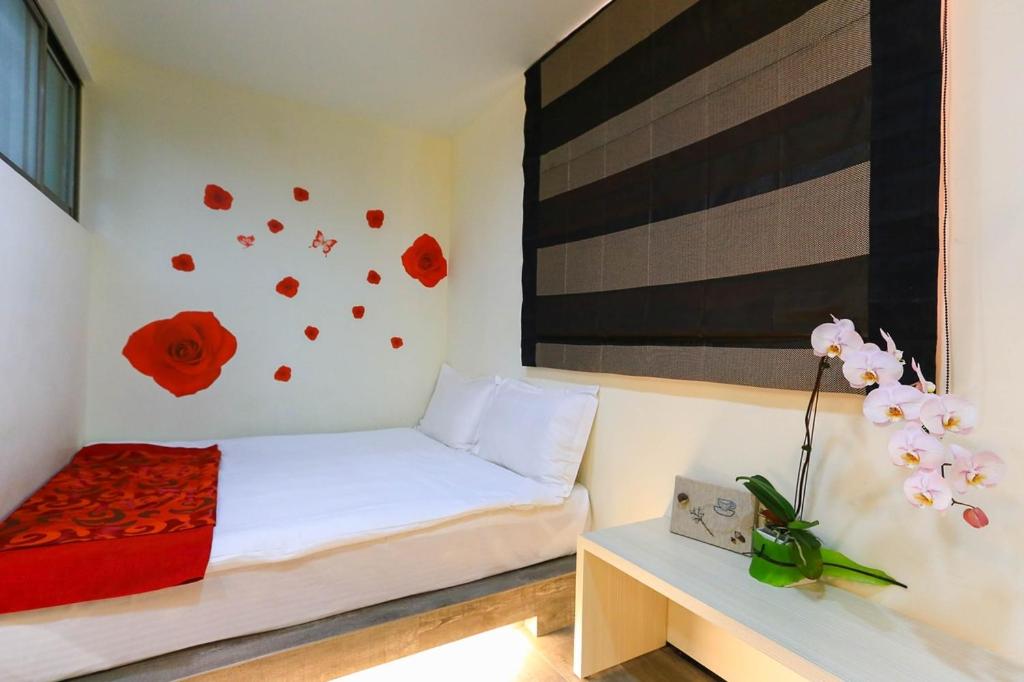 Postel nebo postele na pokoji v ubytování Mei Lodge