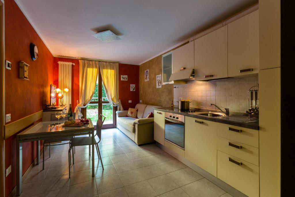 Kuchyň nebo kuchyňský kout v ubytování Residence Rta La Rosa delle Dolomiti