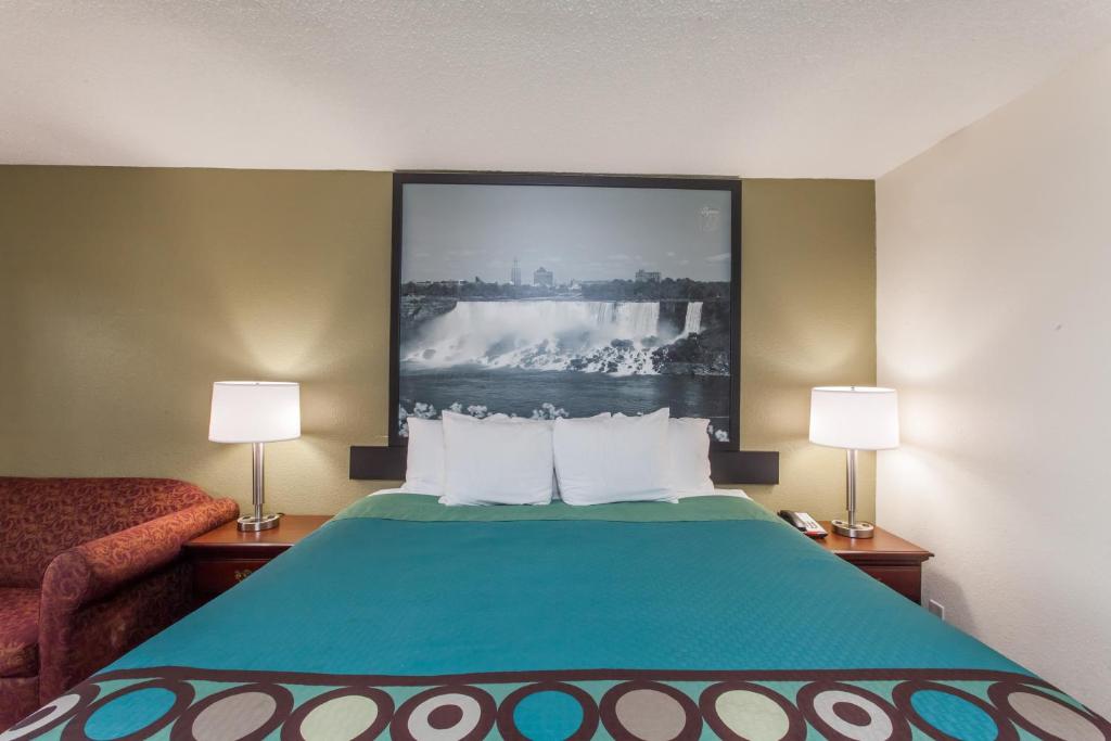 Postel nebo postele na pokoji v ubytování SuperB Hamburg Motel