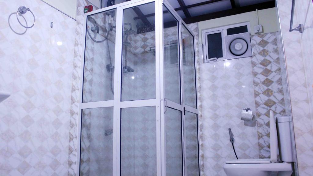 Koupelna v ubytování Anura Home Stay