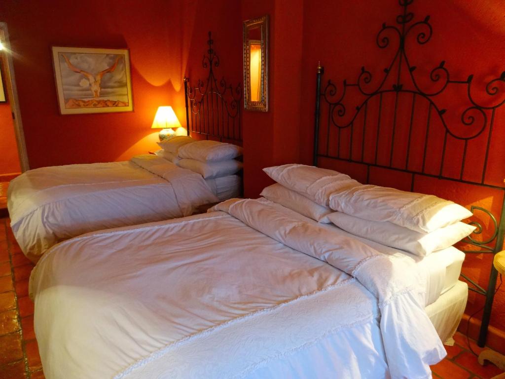 Postel nebo postele na pokoji v ubytování Casa Calderoni