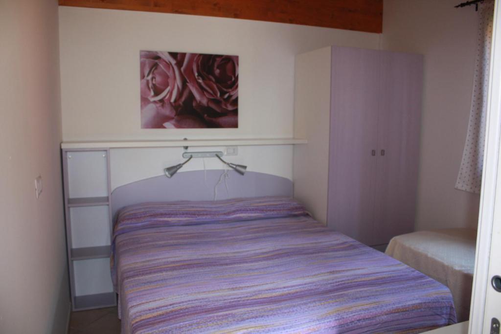 Postel nebo postele na pokoji v ubytování Camping Terrazzo sul mare