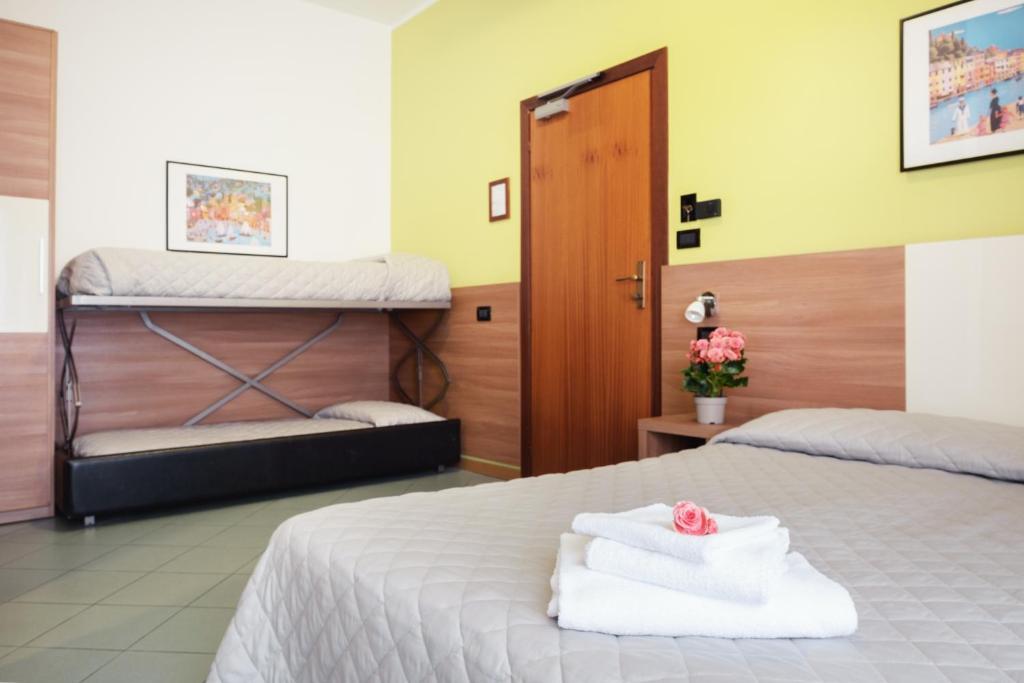 Postel nebo postele na pokoji v ubytování Hotel St Pierre