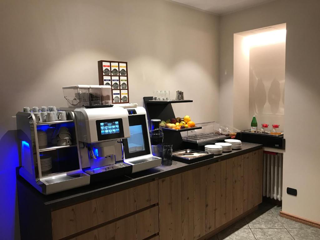 Kuchyň nebo kuchyňský kout v ubytování Hotel Le Cime