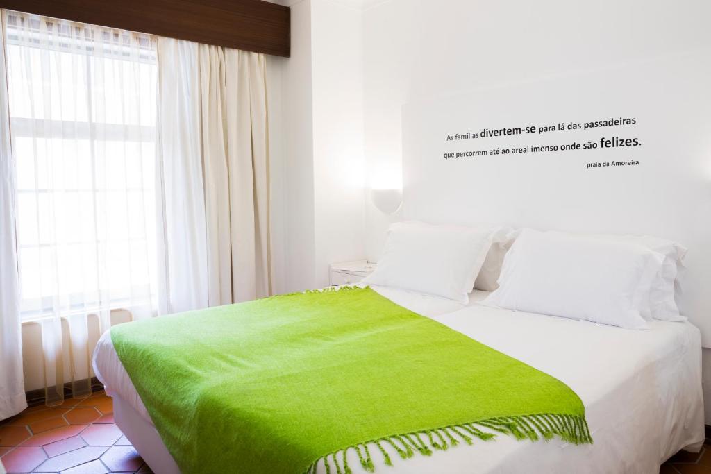Cama o camas de una habitación en Hotel Alcatruz