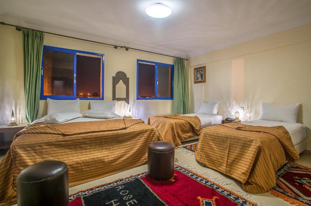 Postel nebo postele na pokoji v ubytování Rose Valley Hotel