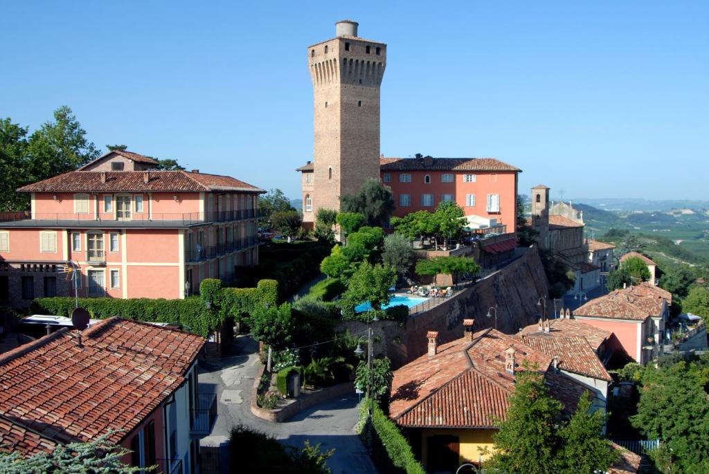 a view of a town with a tower at Hotel Castello di Santa Vittoria in Santa Vittoria dʼAlba