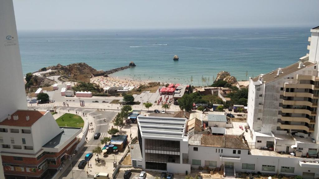 an aerial view of a city and the ocean at Workspace.job in Portimão