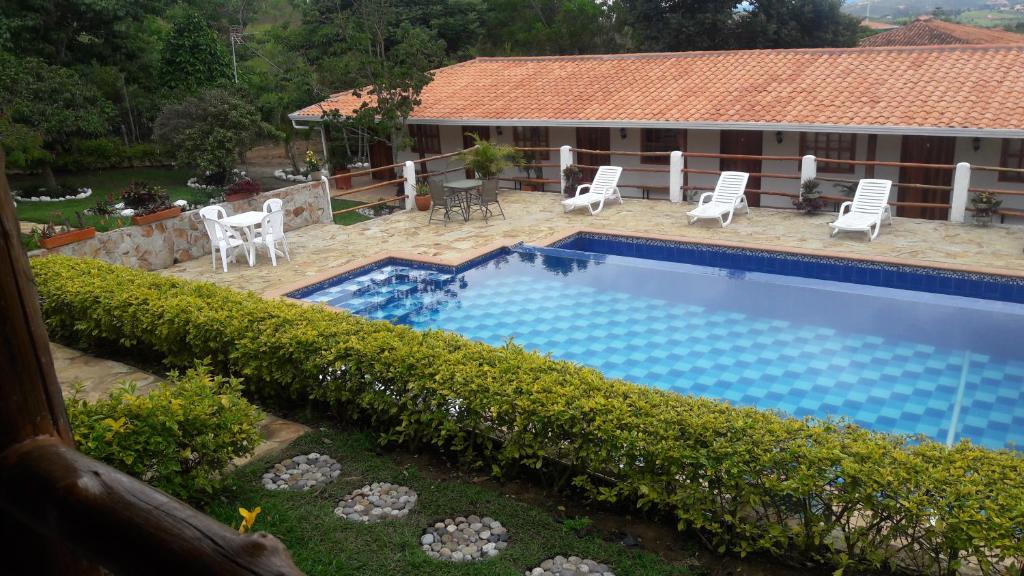 Piscina a Hotel Boutique Santa Clara Mesa de los Santos o a prop