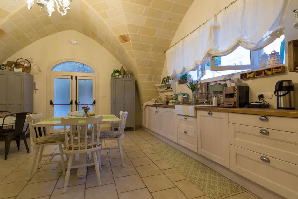 Kuchyň nebo kuchyňský kout v ubytování Masseria Sorani