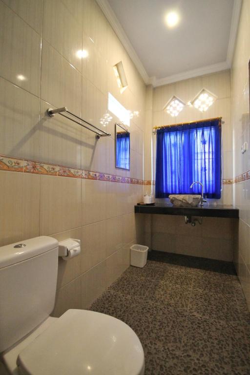 Koupelna v ubytování Surawan Bisma Ubud