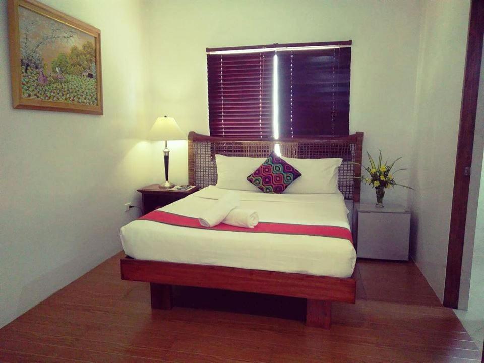 Postel nebo postele na pokoji v ubytování Discover Boracay Hotel
