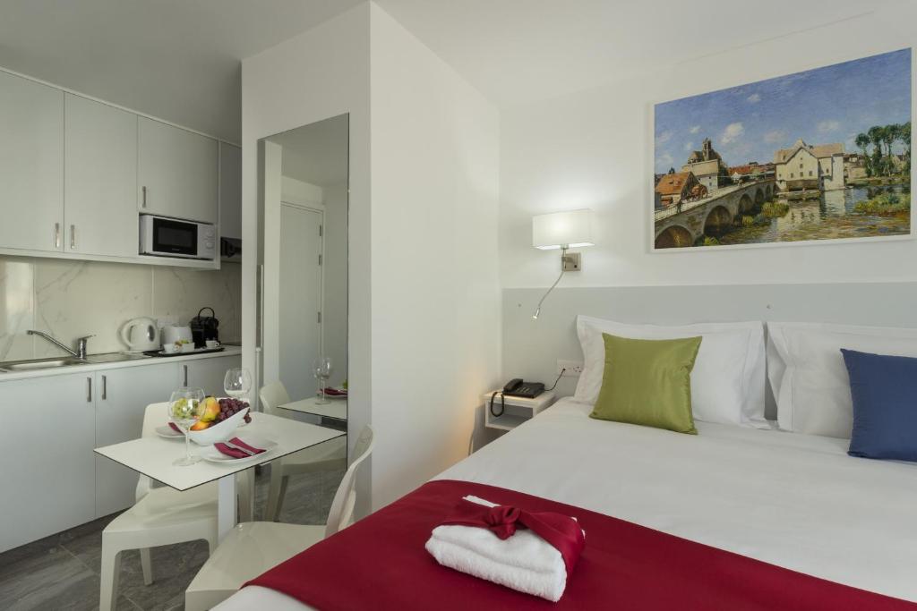 Kuchyň nebo kuchyňský kout v ubytování Art & Wine Boutique Hotel