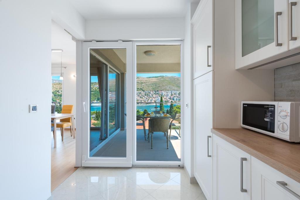Kuchyňa alebo kuchynka v ubytovaní Apartment Maro Bayview