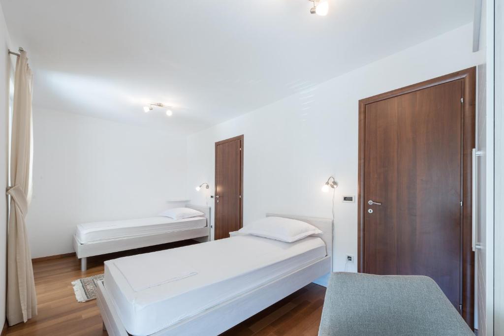 Posteľ alebo postele v izbe v ubytovaní Apartment Maro Bayview