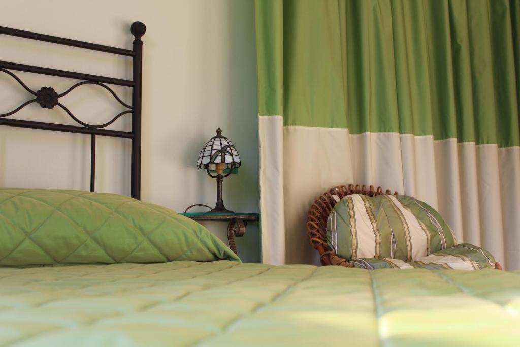 Кровать или кровати в номере Villa Augusta