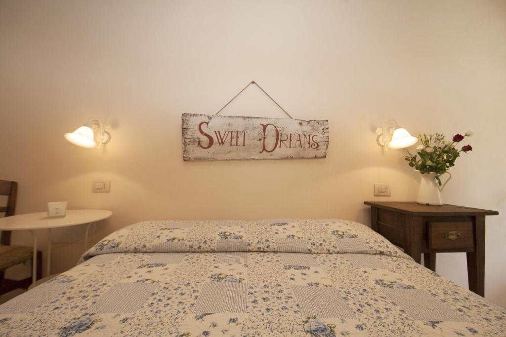 Postel nebo postele na pokoji v ubytování Fonte di Zeno