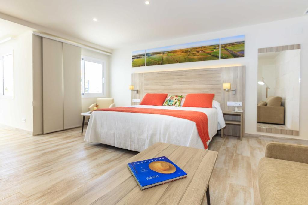 Postel nebo postele na pokoji v ubytování Hotel Levante