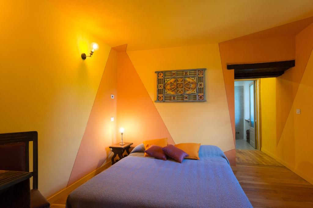 Postel nebo postele na pokoji v ubytování Quart de Lune - Boutique Stay