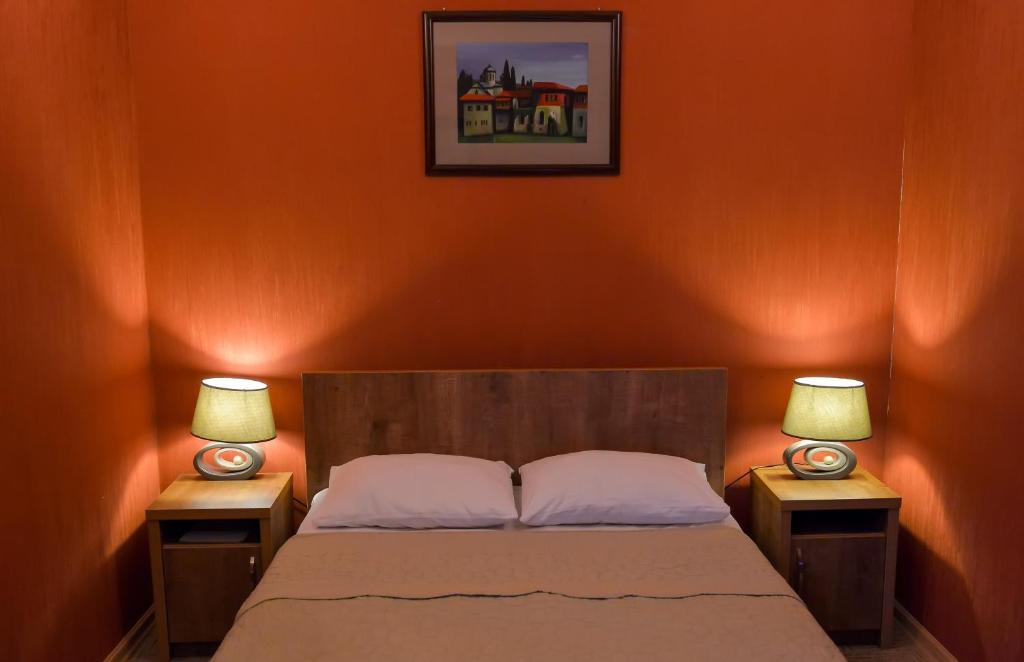 Postel nebo postele na pokoji v ubytování Hotel Old Town